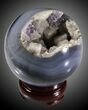 Polished Brazilian Agate Sphere With Amethyst #31349-1